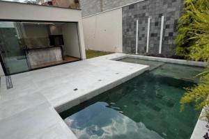 VENDO EXCELENTE CASA "CONCEITO MODERNO" NO RESIDENCIAL TIRADENTES